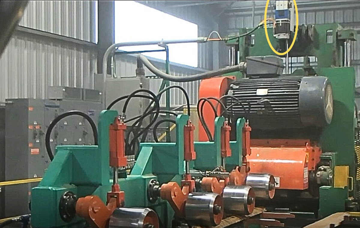 SAWMILL PLANER HEAD LIFTING SYSTEM: HYBRID ACTUATOR ELIMINATED LEAKY HYDRAULICS THAT SPOILED FINISHED LUMBER PRODUCT